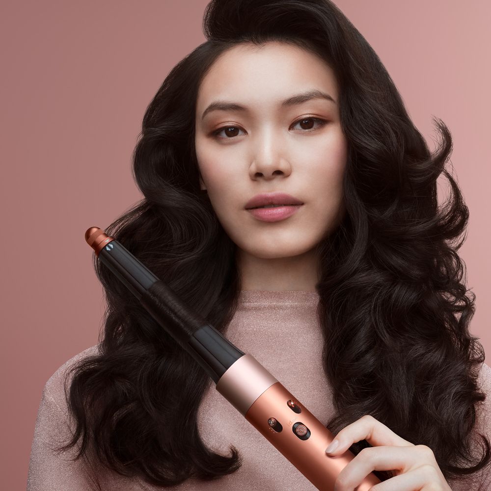 Model shows off her hair styled using the Dyson Airwrap ID multi-styler and dryer.