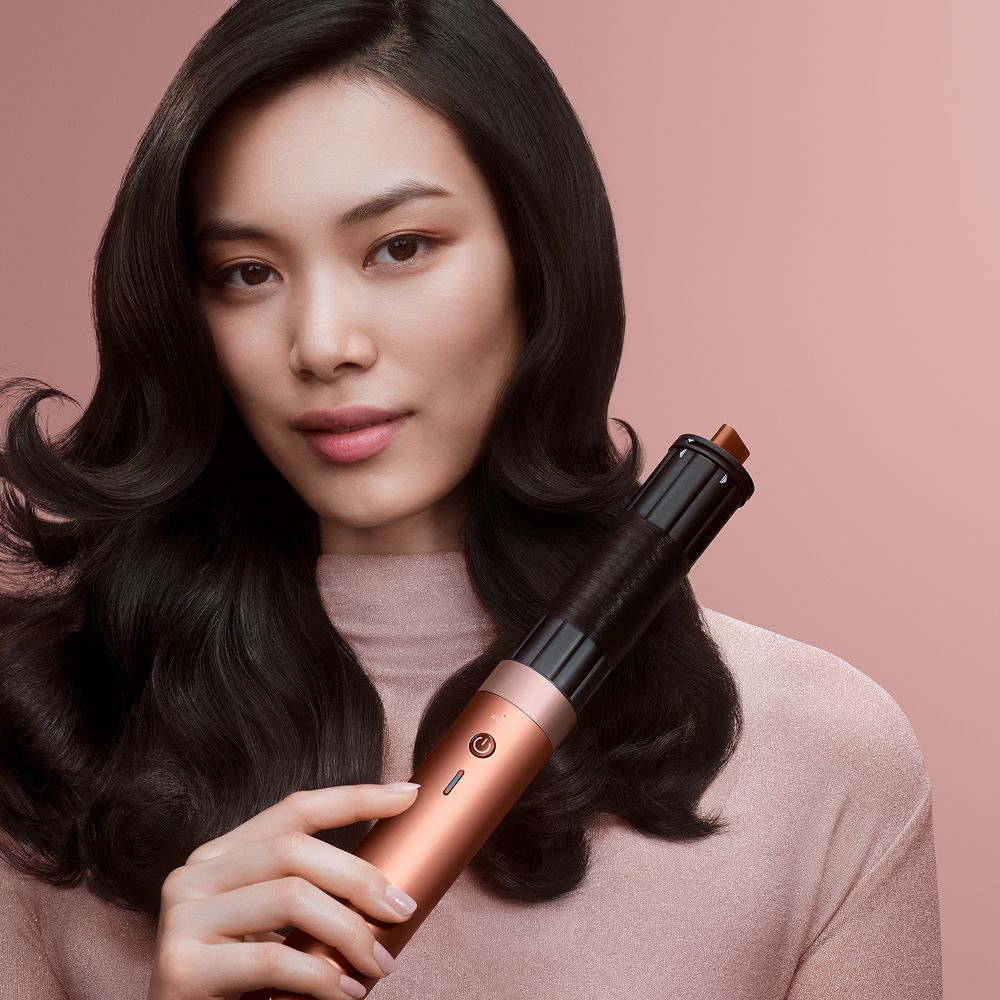 Model shows off her hair styled using the Dyson Airwrap ID multi-styler and dryer.