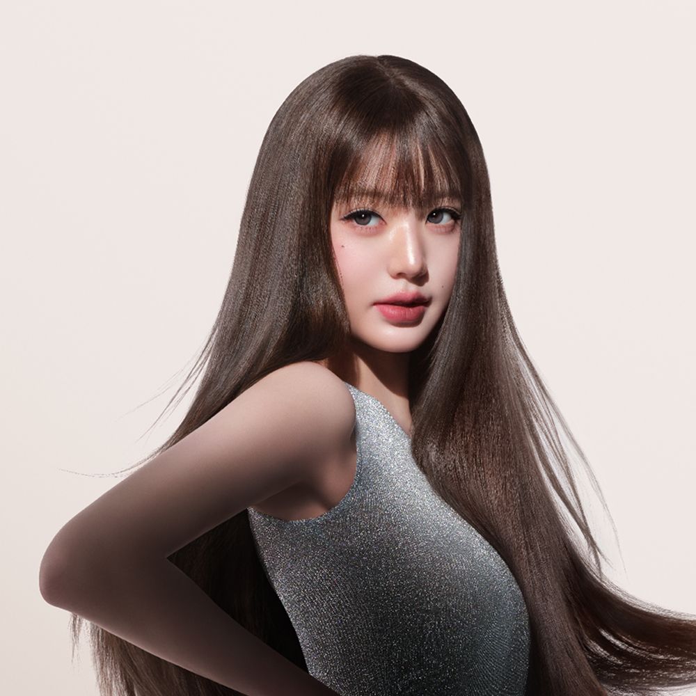 Model with hair styled using Dyson Beauty devices and products.