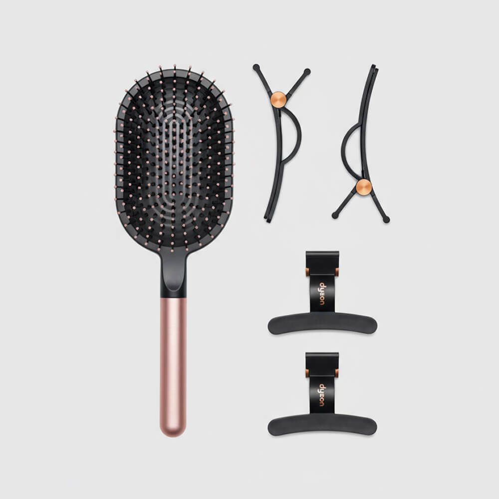 A range of Dyson hair care accessories.