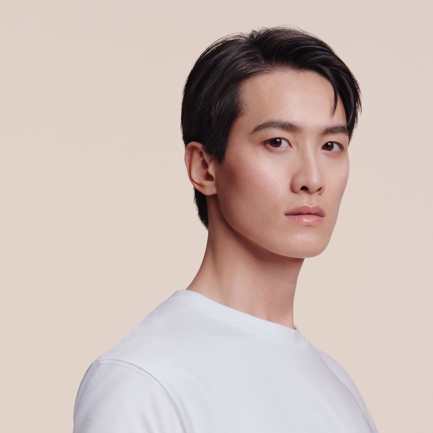 A model with hair styled and dried with the Dyson Supersonic Travel hair dryer.