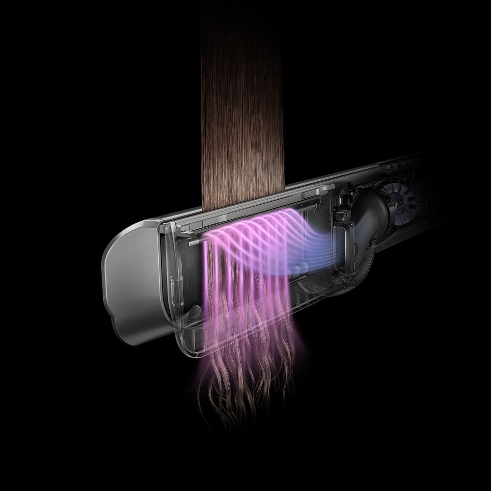 剖面圖顯示氣流如何穿過 Dyson Airstrait 二合一吹風直髮器。