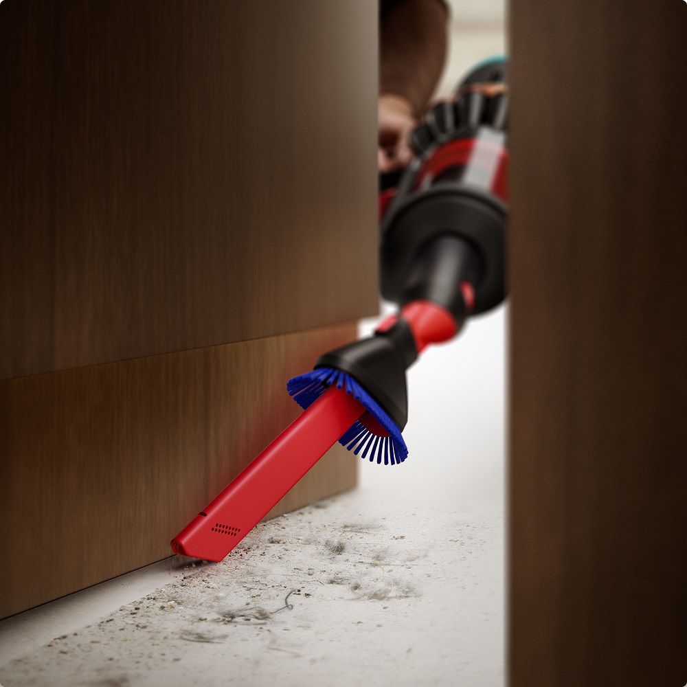 The Awkward gap tool 2.0 is used to clean a gap between furniture.