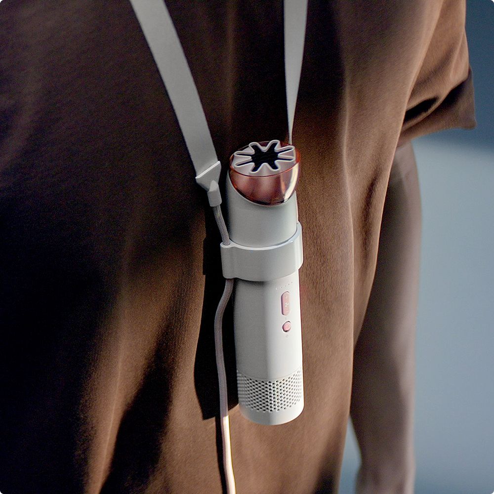 The Dyson HushJet Mini Cool portable fan in the Neck Dock.