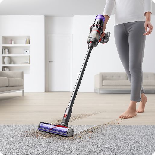The Dyson V9 vacuum cleans hard floors and carpet in a home with the Motorbar cleaner head.