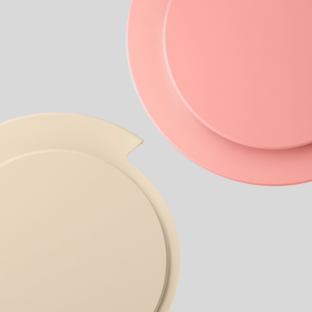 Two Dyson OnTrac caps in Ceramic Chalk and Oyster Pink