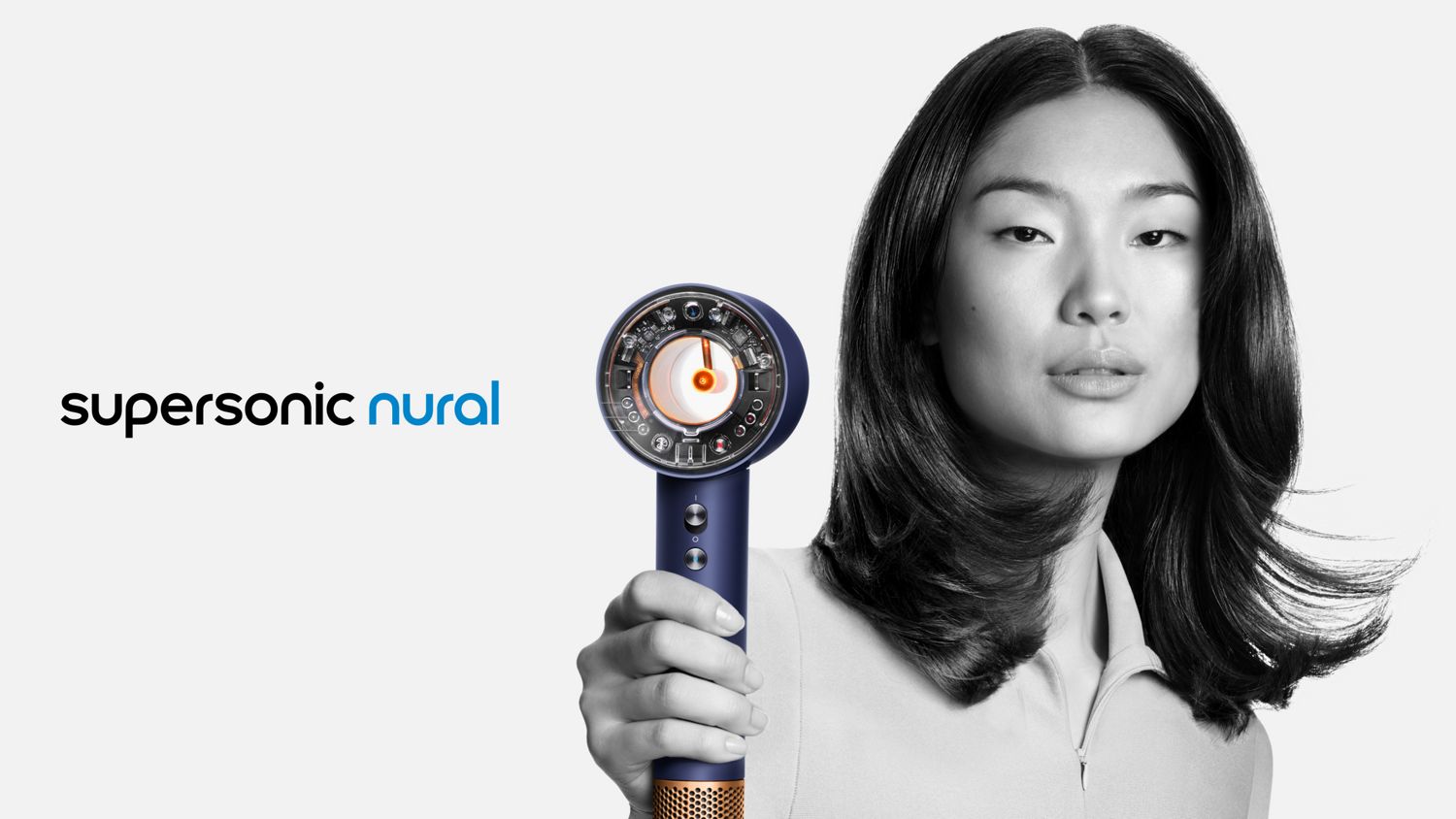 A rear and side view of the Dyson Supersonic Nural hair dryer.