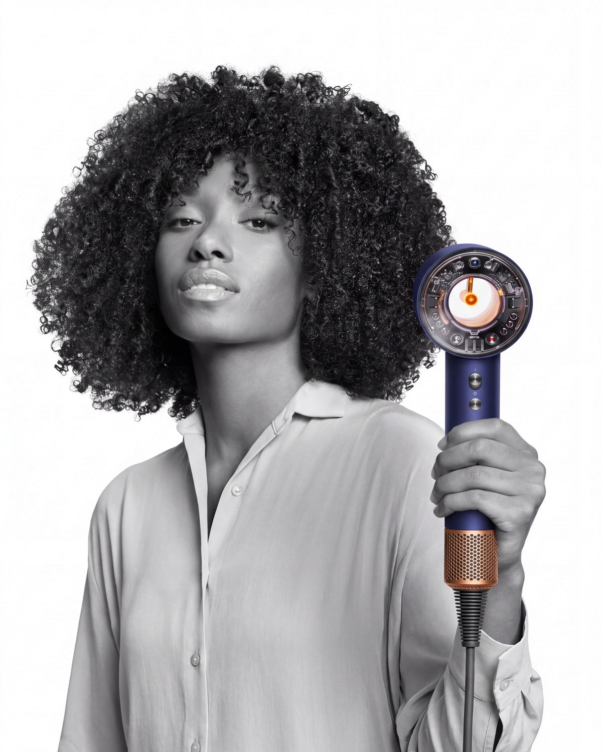 A rear and side view of the Dyson Supersonic Nural hair dryer.