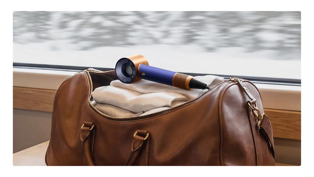 Dyson Supersonic Travel hair dryer in an carryall bag.