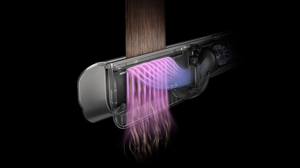 剖面圖展示 Dyson Airstrait 二合一吹風直髮器中的氣流。