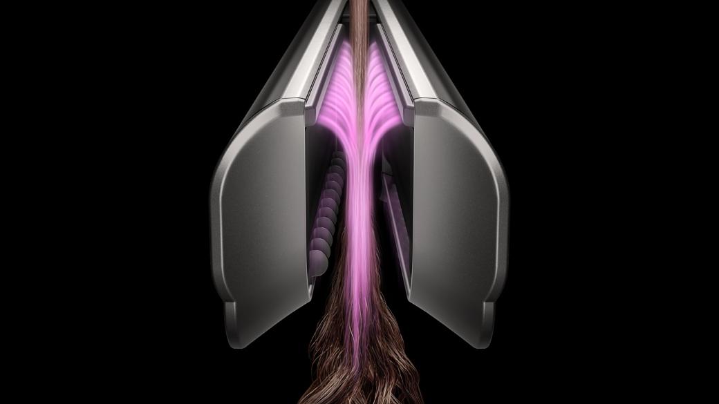 粉紅色圖示顯示氣流穿過 Dyson Airstrait 二合一吹風直髮器的內置梳齒設計。