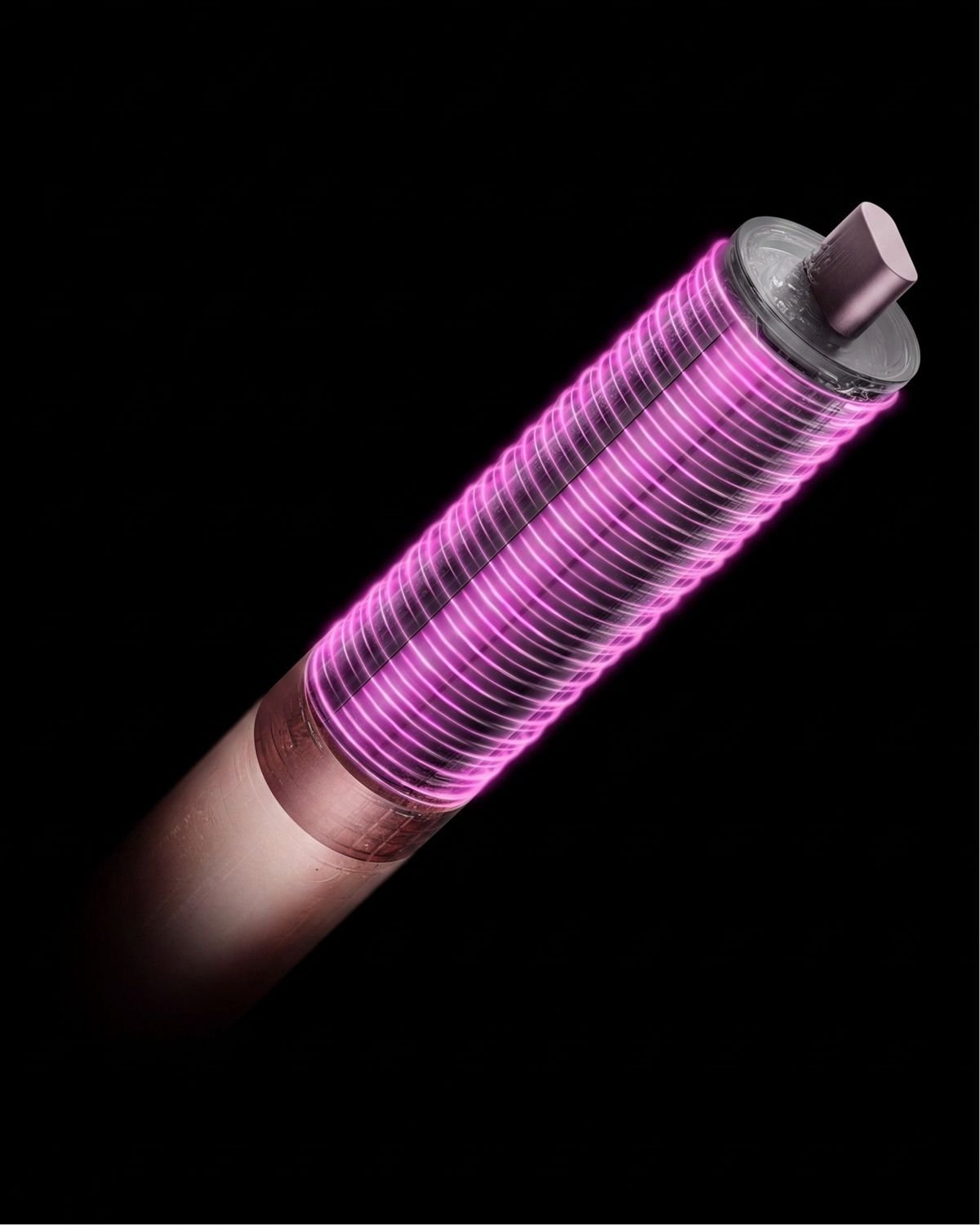 Lyserød grafik viser luftstrømmen omkring Dyson Airwrap 40 mm Co-anda2x-krøllespole.