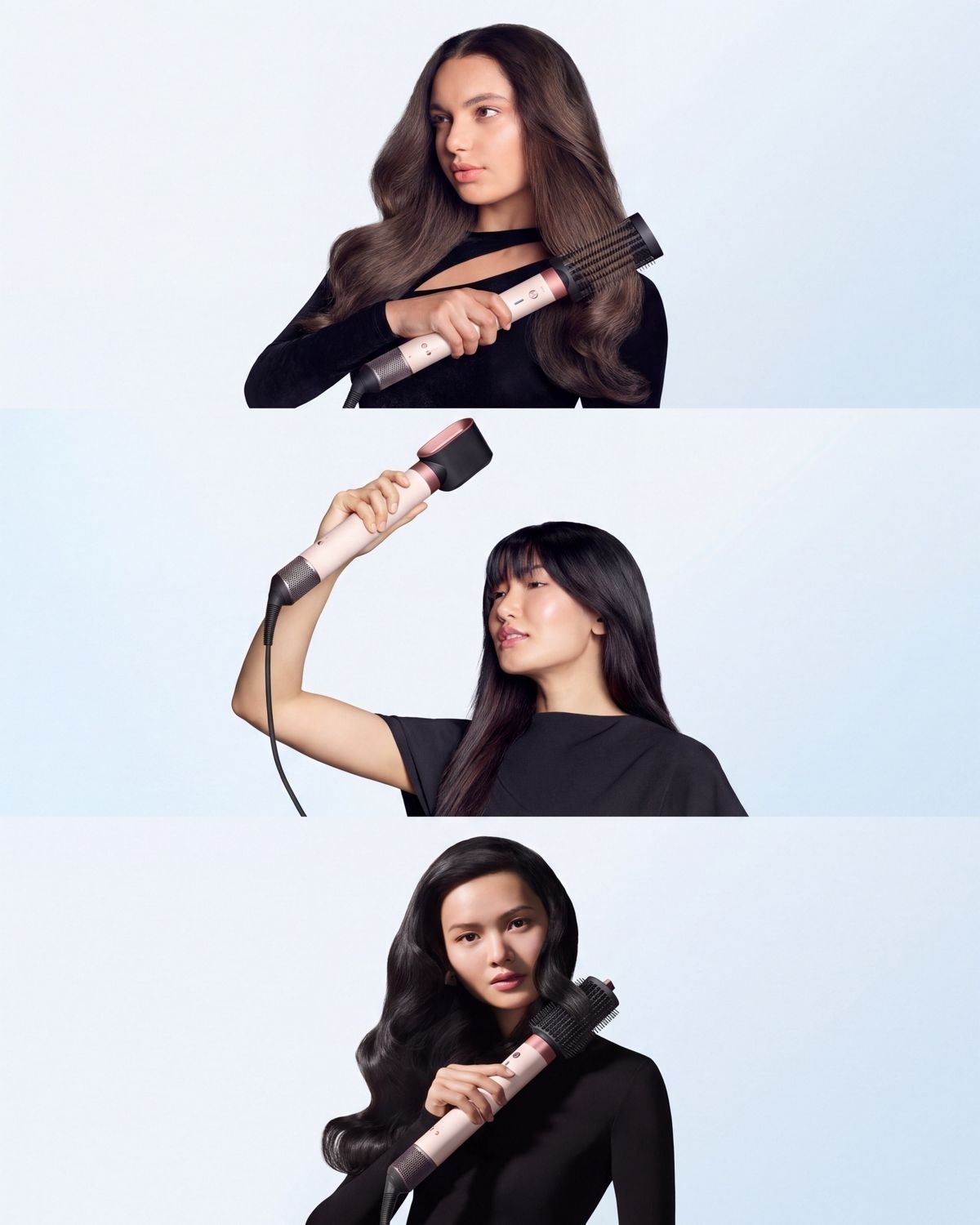 A trio of models dry and style their hair with the Dyson Airwrap Co-anda2x multi-styler and dryer.