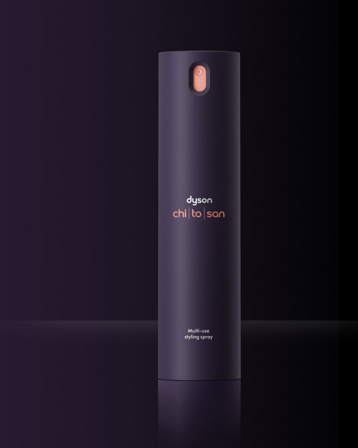 Dyson Chitosan multi-use styling spray next to a model with styled hair.