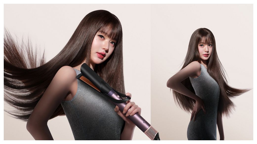 Jang Won-young straightens her hair with the Dyson Air straightener 2x attachment.