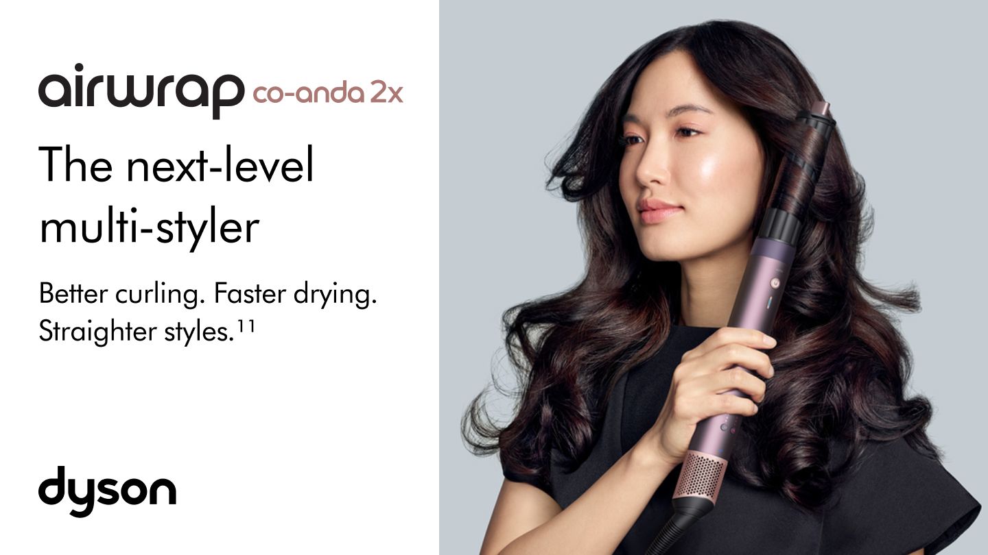 A model with dark hair adds curls using the Dyson Airwrap Co-anda2x multi-styler and dryer. The next-level multi-styler.