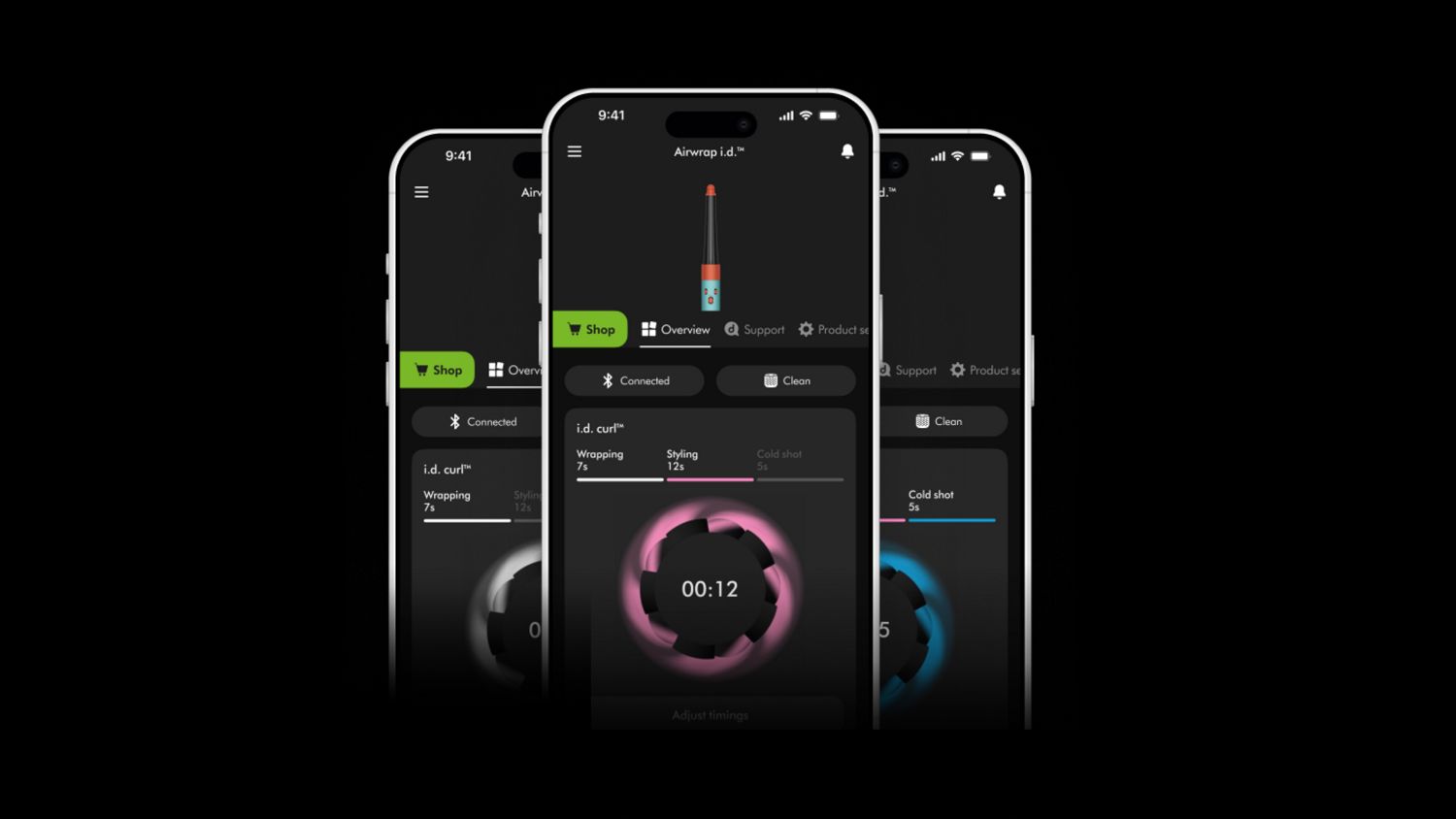 Model styling long red hair with a Dyson Airwrap multi-styler, creating bouncy curls.