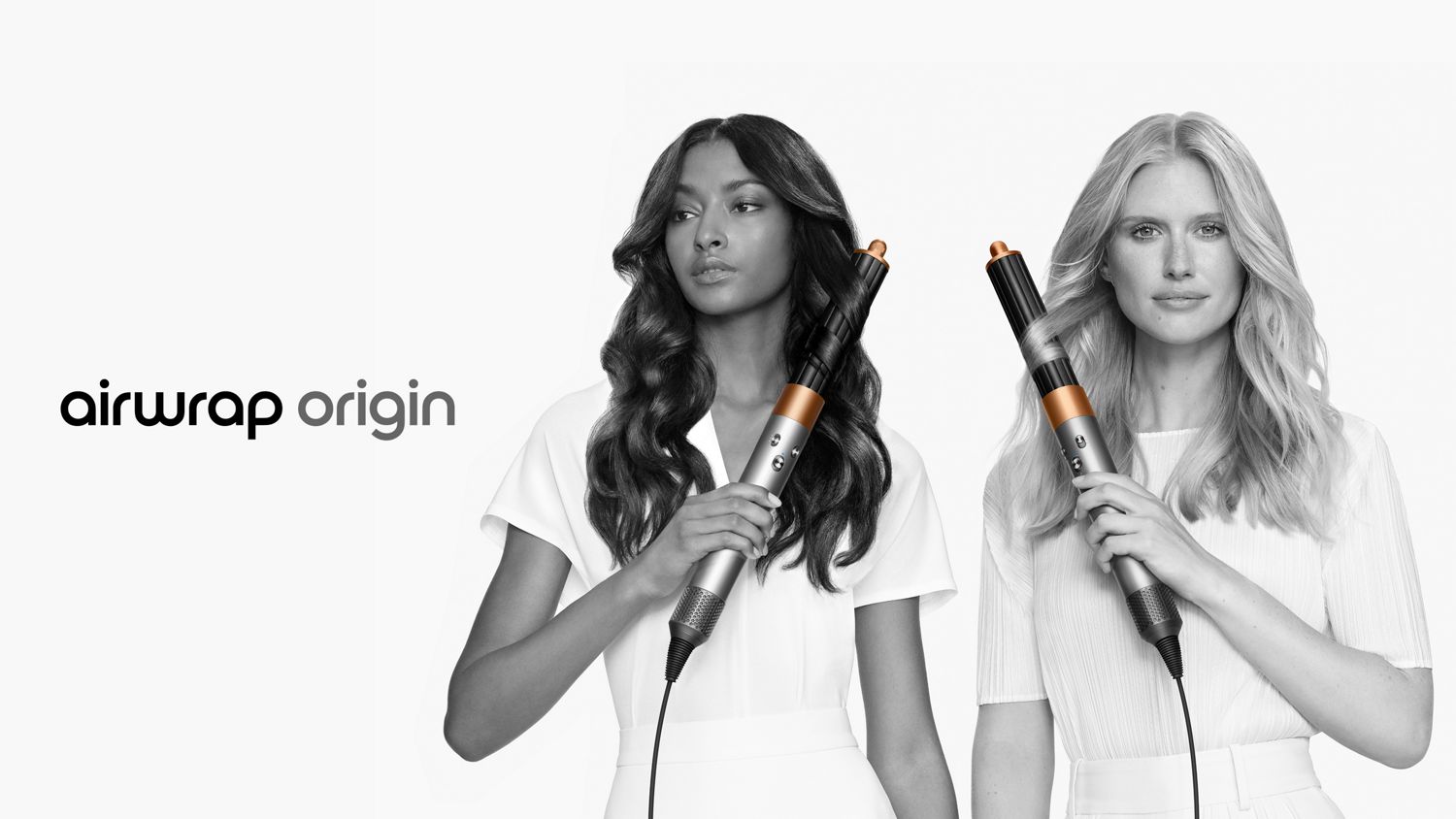 Two models with different hair types style their hair with the Dyson Airwrap multi-styler and dryer.