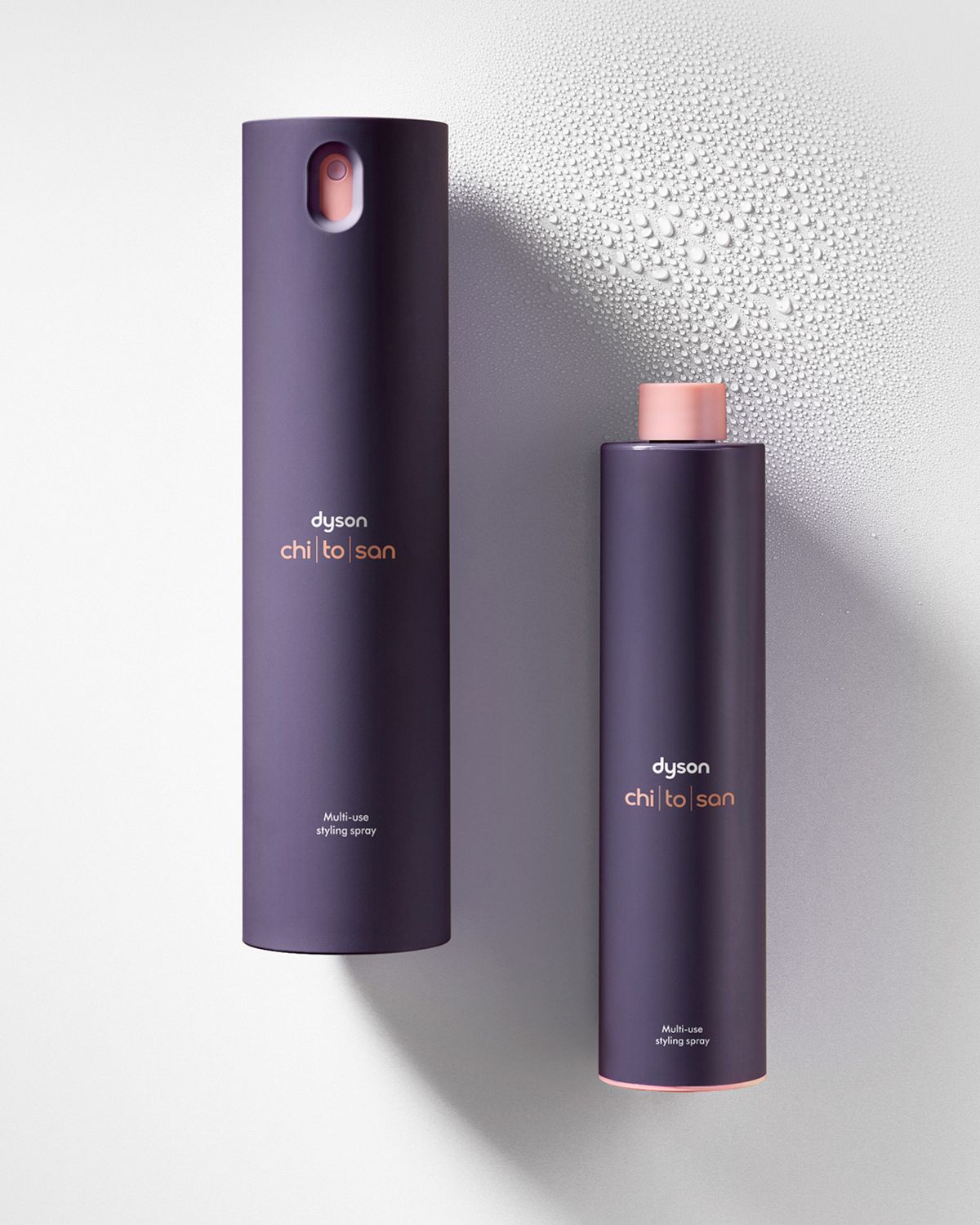 Dyson Chitosan Multi-use styling spray 165ml and a refill.