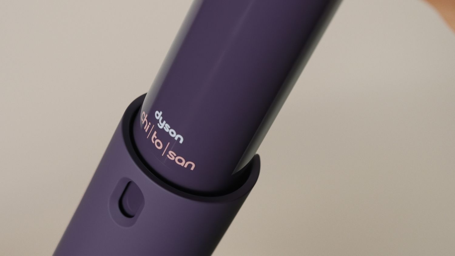 Dyson Chitosan Multi-use styling spray refill is inserted into the spray-bottle.