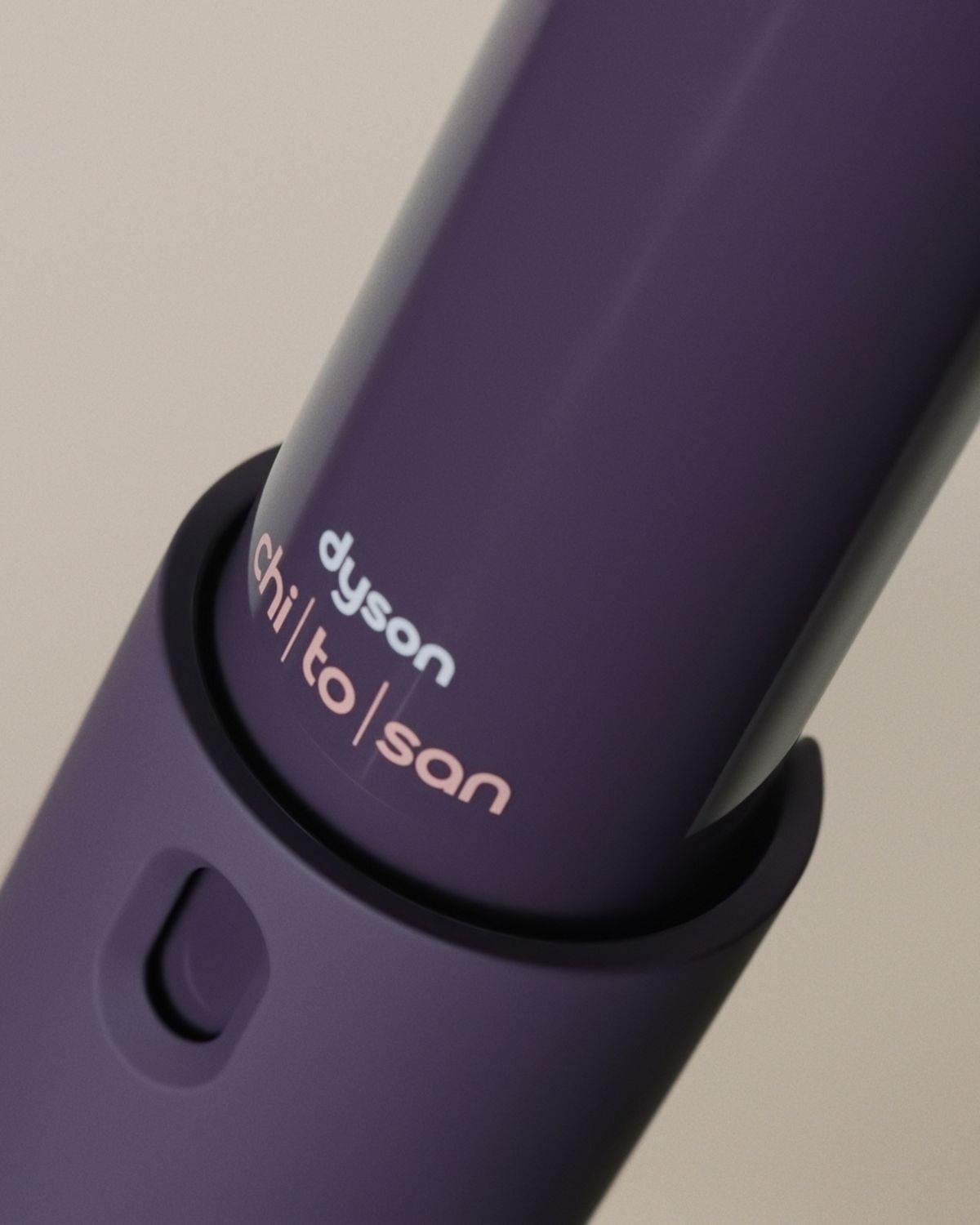 Dyson Chitosan Multi-use styling spray refill is inserted into the spray-bottle.