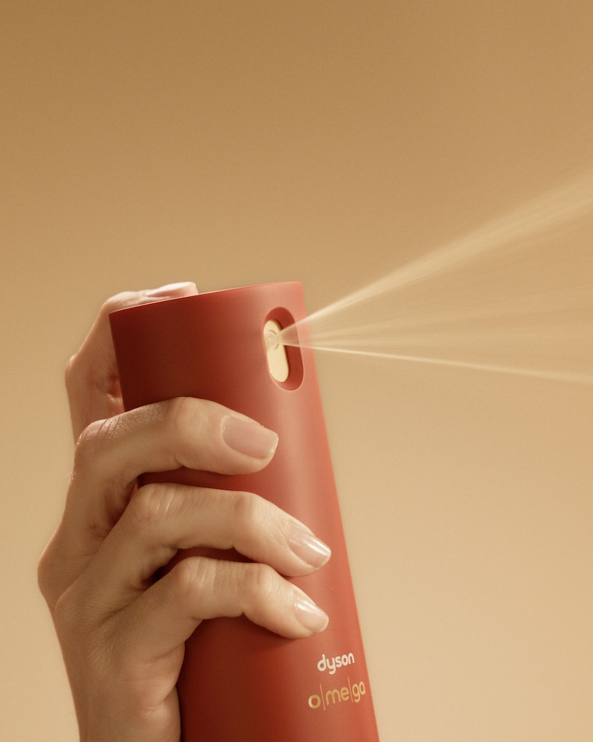 The Dyson Omega leave-in conditioning spray dispenses a fine mist.