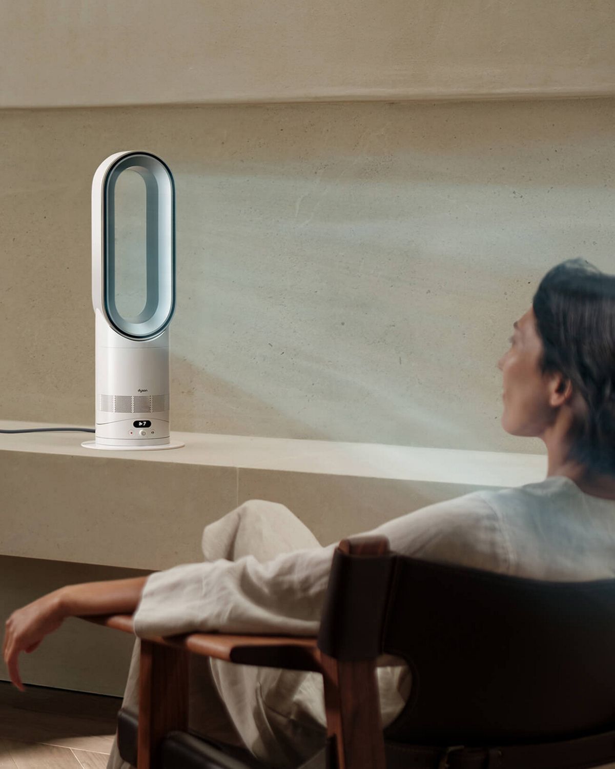 The Dyson Hot+Cool HF1 Remote Link Pre-heat heater and cooling fan cools a room with powerful airflow.