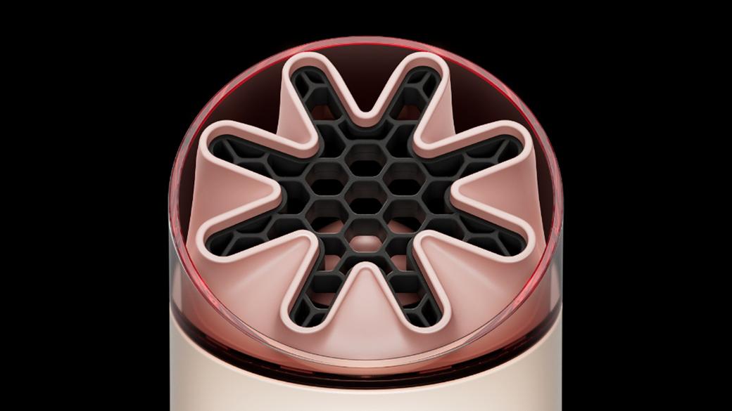 Close-up of the HushJet nozzle and honeycombed mesh on the Dyson HushJet Mini Cool portable fan.