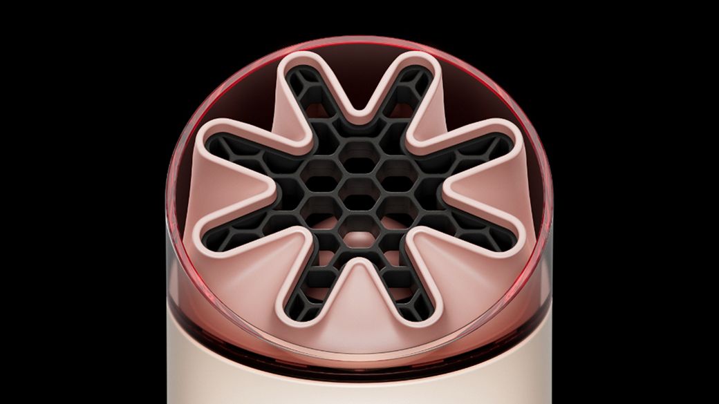 Close-up of the HushJet nozzle and honeycombed mesh on the Dyson HushJet Mini Cool portable fan.