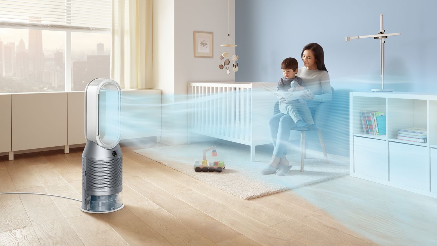 Dyson purifier humidy+cool autoreact PH3A humidifiying and purifying the air while a mother reads to her son