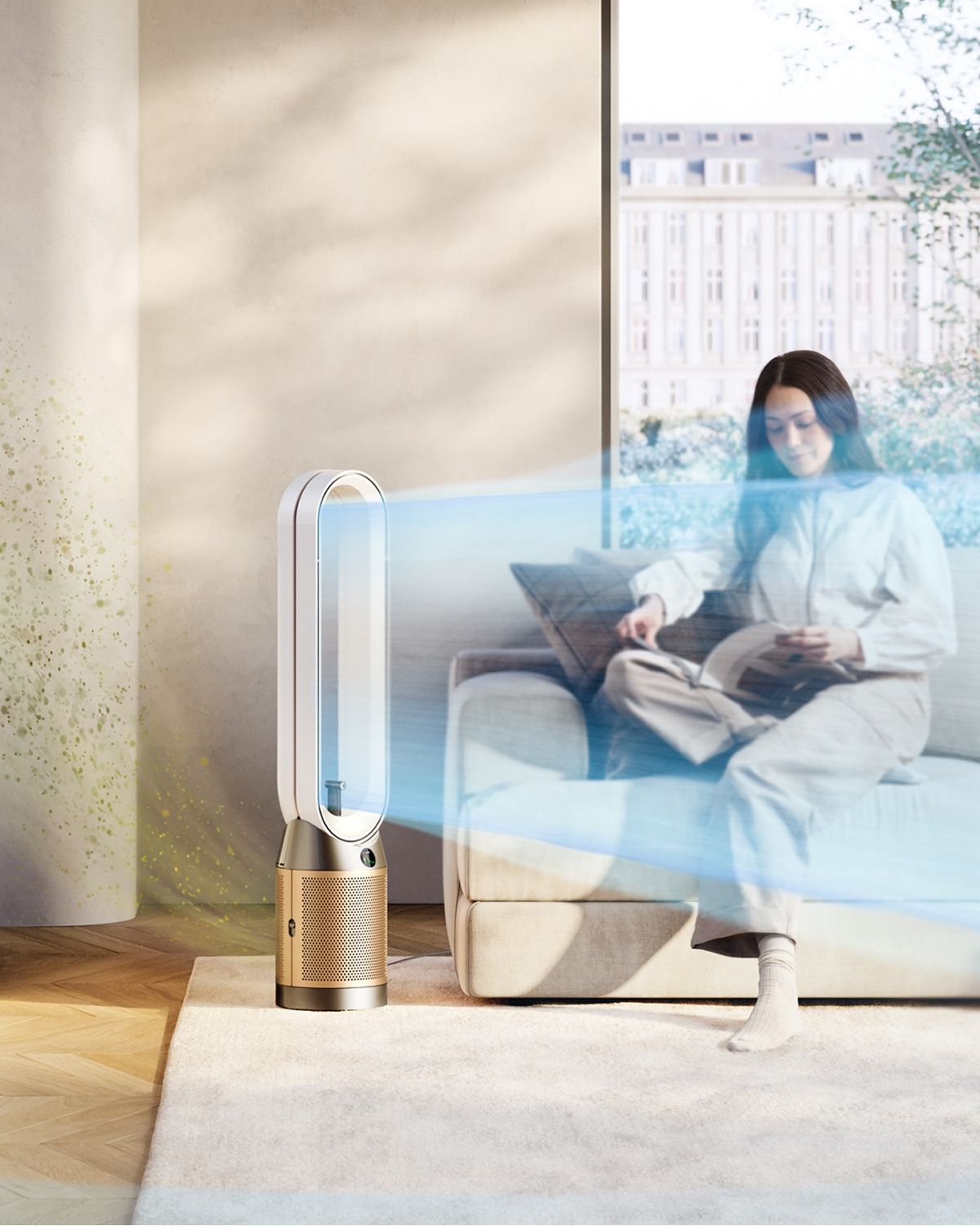 Dyson Find+Follow Purifier Cool fan cools a room with airflow while a person cooks.