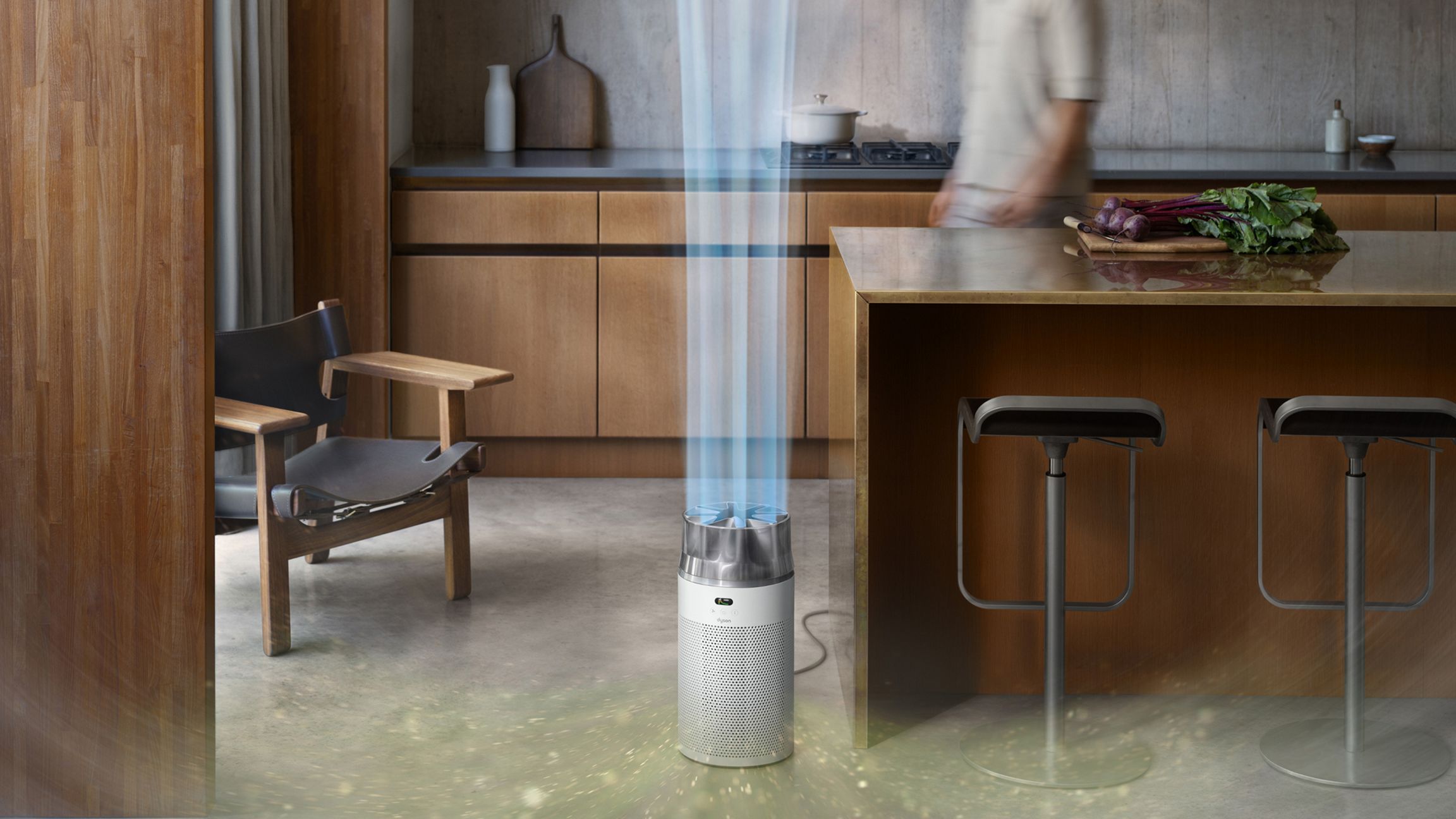 The Dyson HushJet Compact Purifier purifies air in a kitchen.