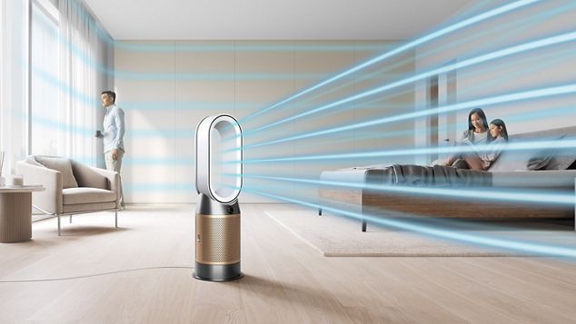 Family in living room with Big & Quiet purifier