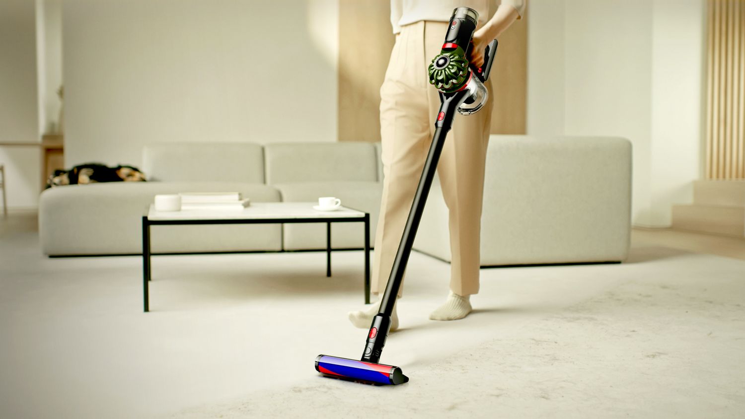 The Dyson V8 Cyclone cordless vacuum is used with the Fluffy cleaner head to clean around the home.