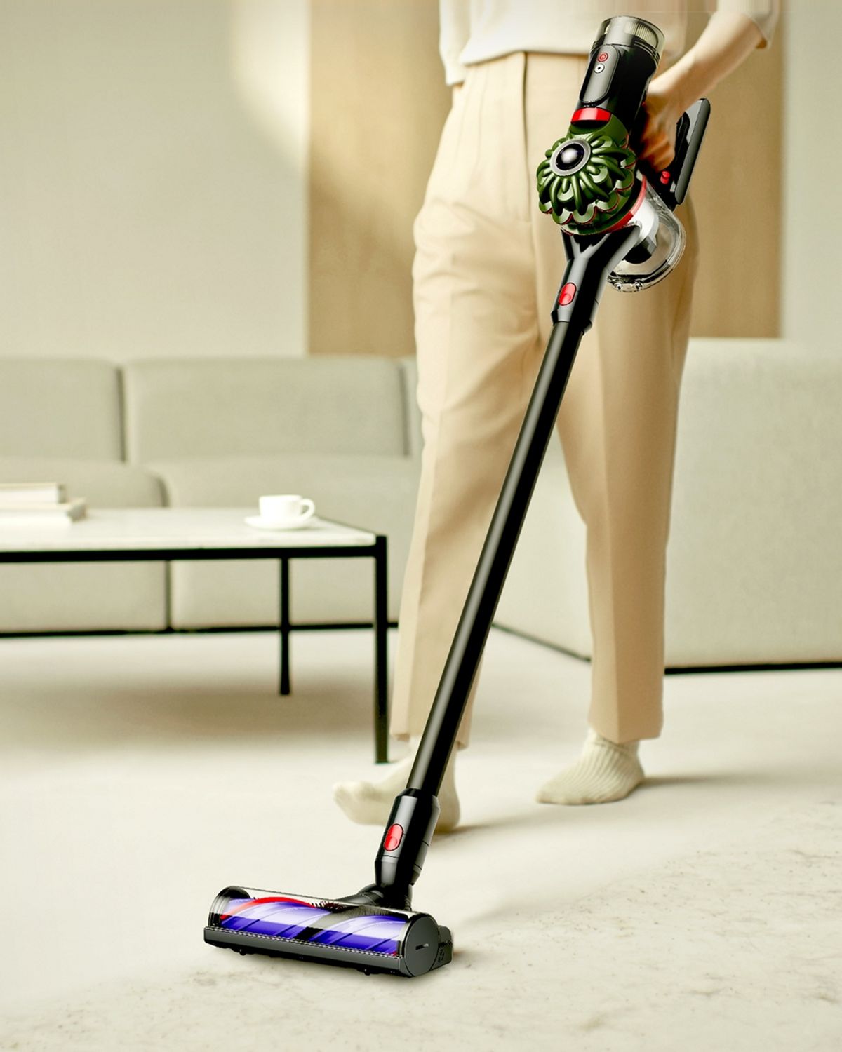 The Dyson V8 Cyclone cordless vacuum is used with the Motorbar cleaner head to clean around the home.