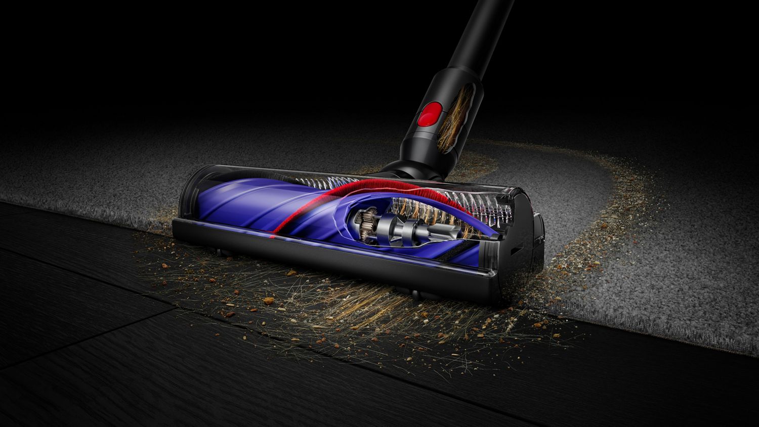 The Dyson Motorbar cleaner head cleans debris between carpet and a hard floor.