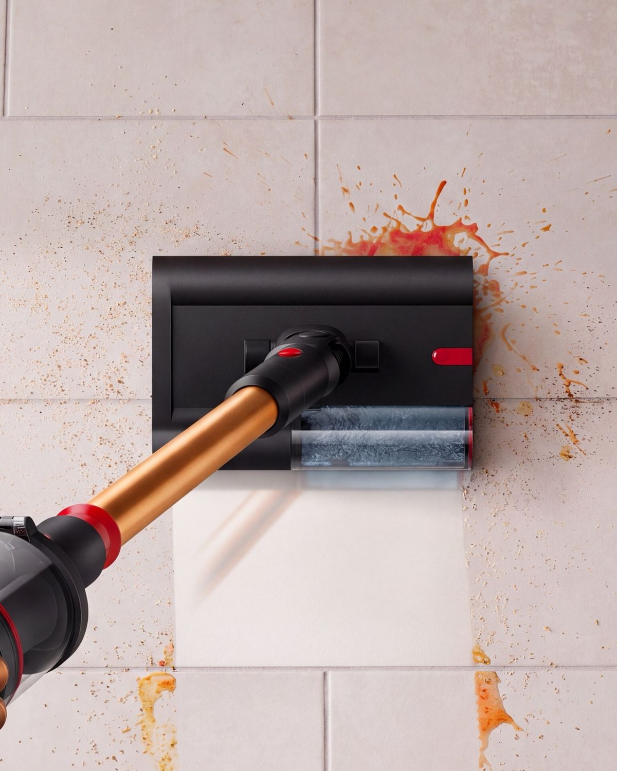 The Dyson Submarine wet roller head cleaning spills from hard floor.