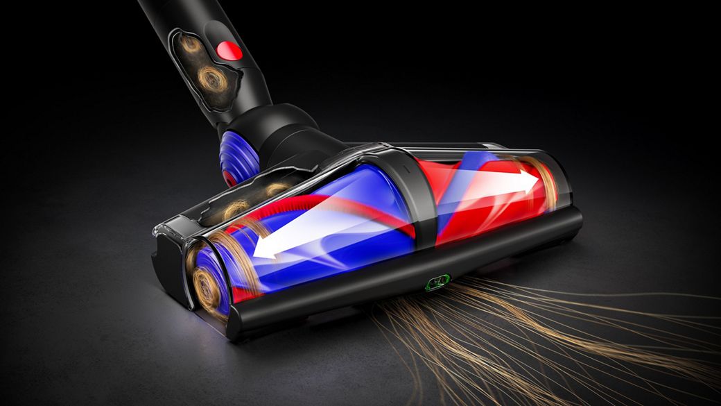 Close-up of the Dyson De-tangling conical head as it detangles long hair.