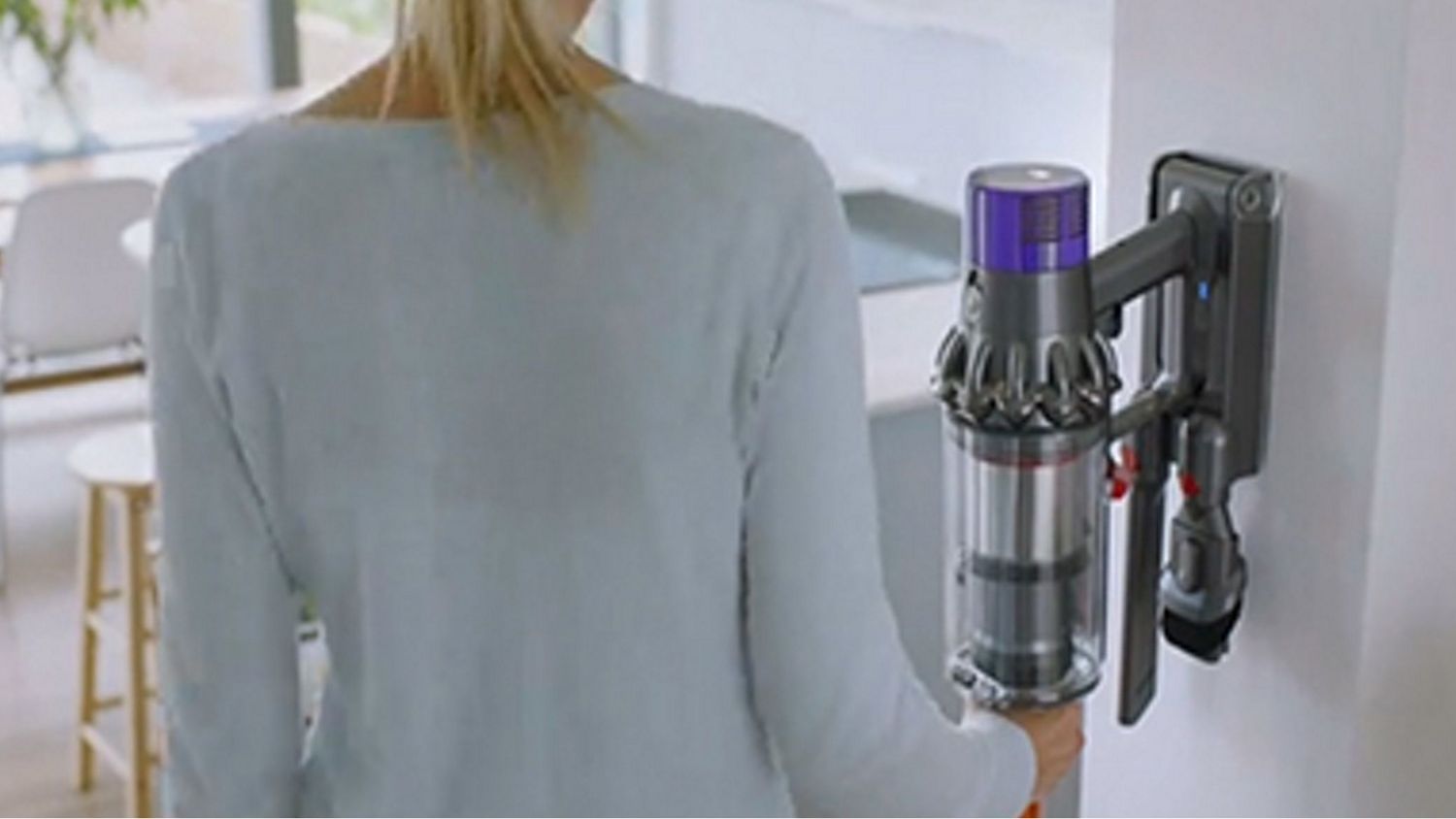 Dyson Cyclone V10 Submarine wet and dry vacuum cleaner retrieved from its Wall dock.