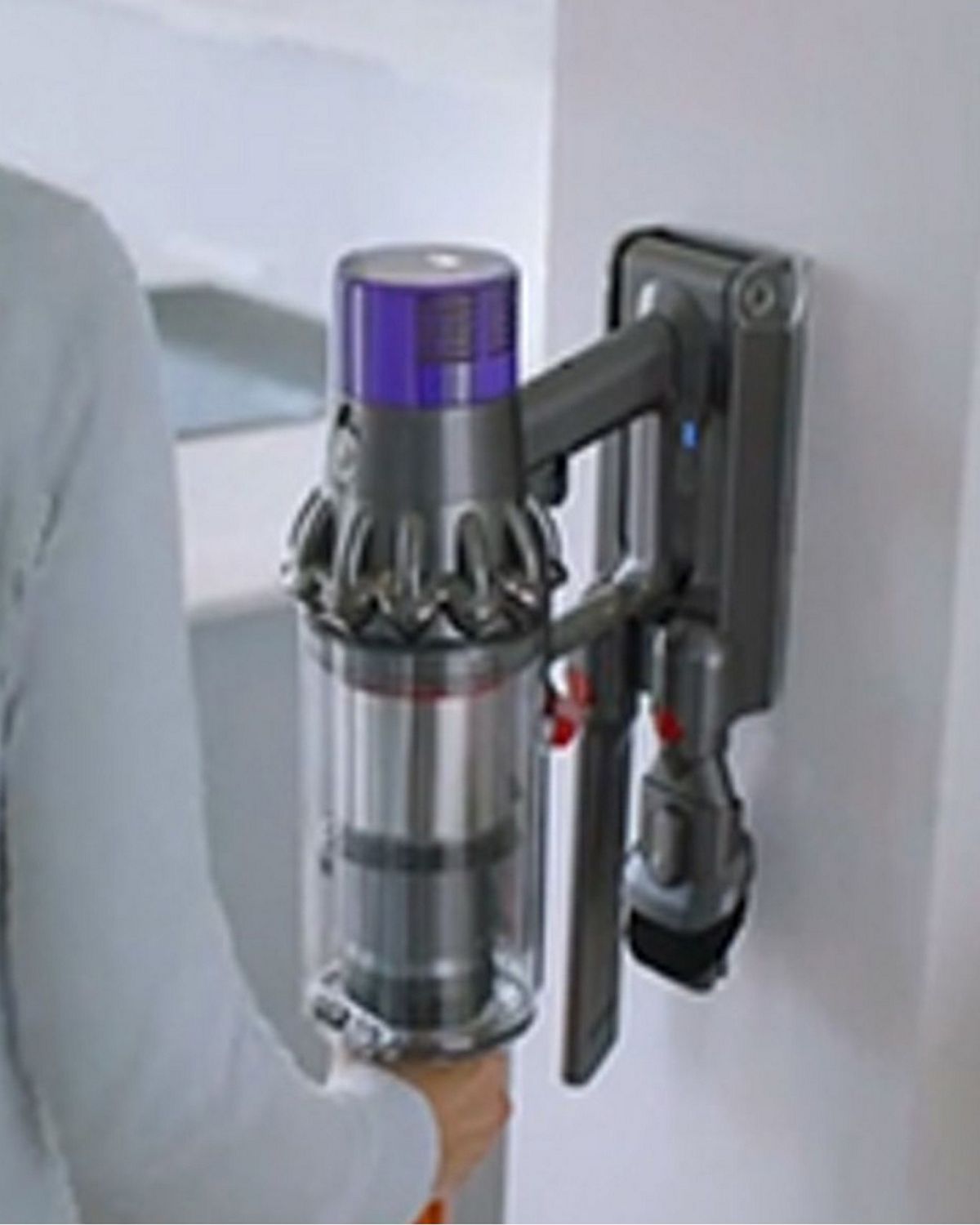 Dyson Cyclone V10 Submarine wet and dry vacuum cleaner retrieved from its Wall dock.