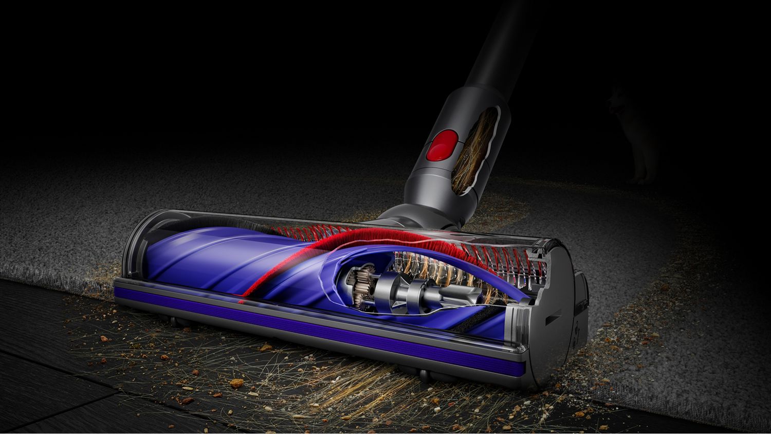 Dyson Motorbar cleaner head used to clean dust and debris from a hard floor.