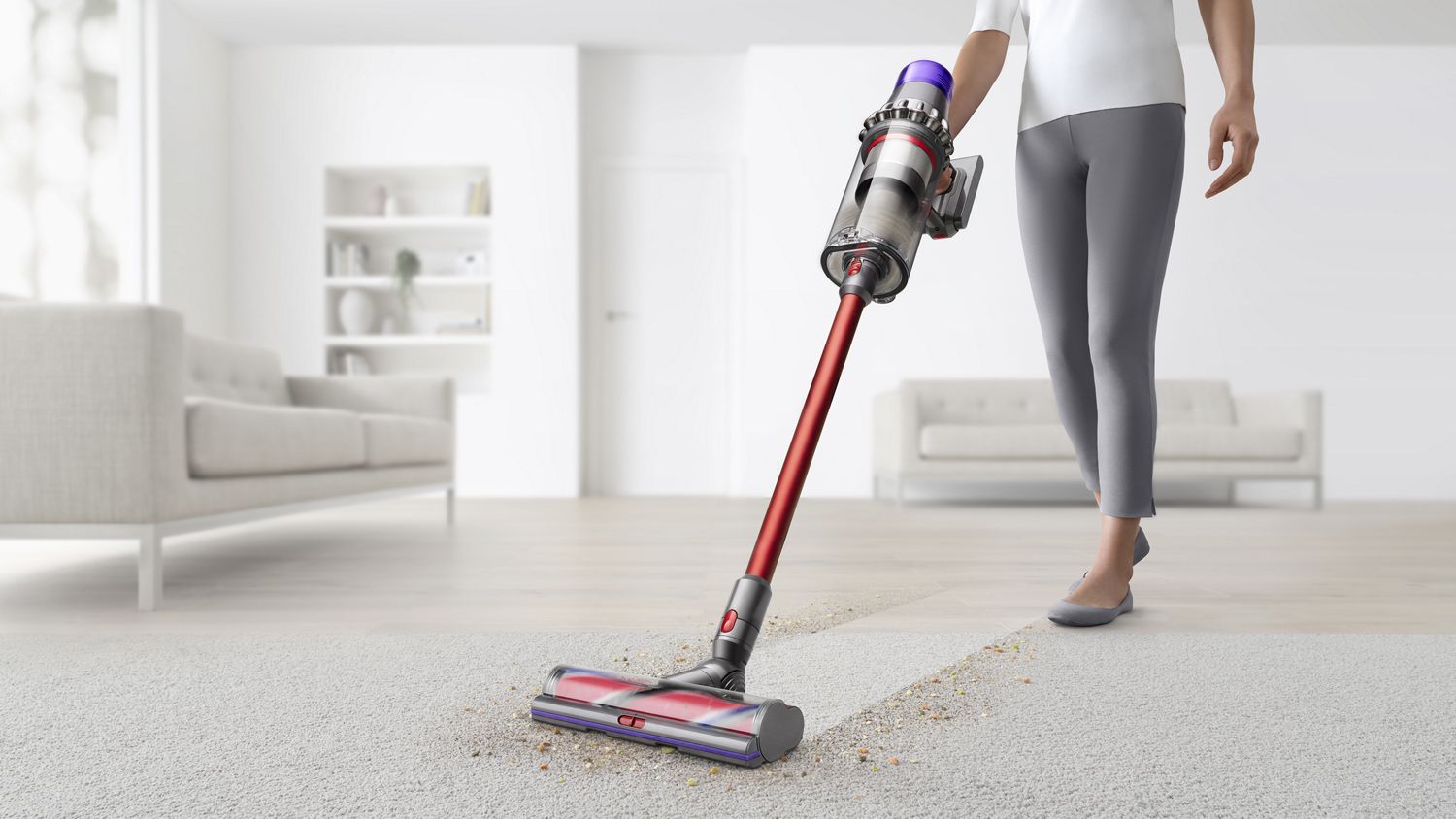 Dyson Outsize vacuum cleaner head moving from hard floor to carpet.