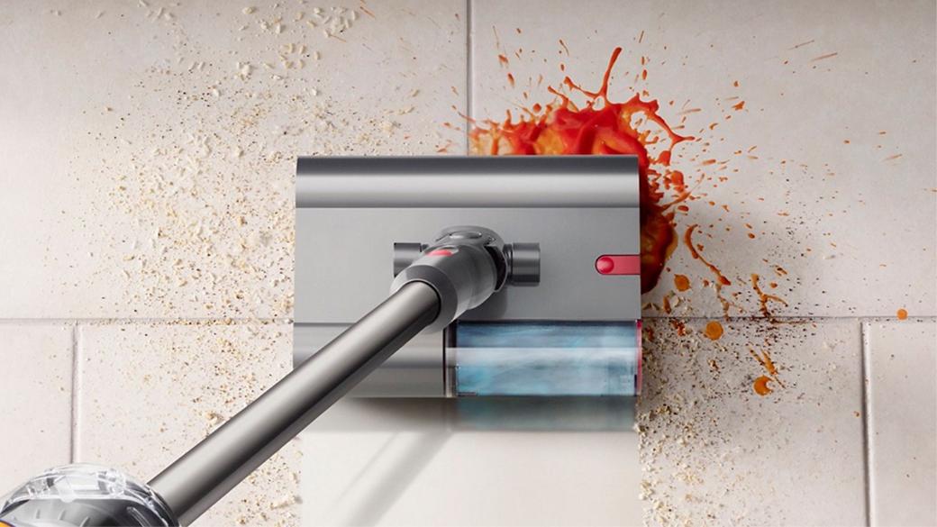 The Dyson Submarine cleaner head used to clean a spill from a hard floor.