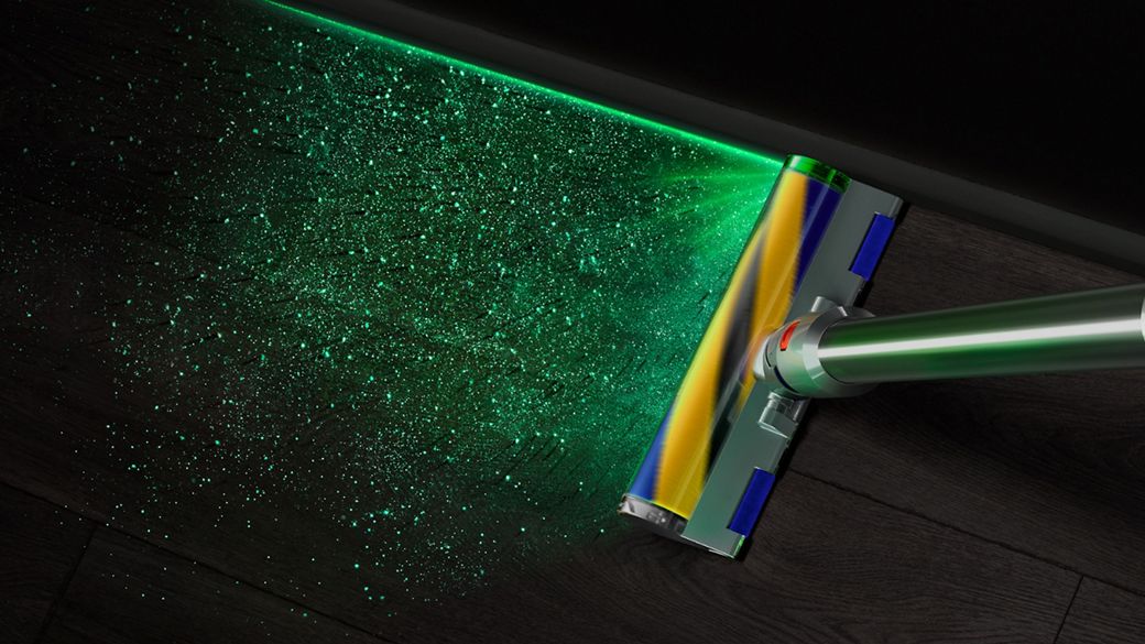 Dyson Fluffy Optic cleaner head used to clean dust and debris from a hard floor.