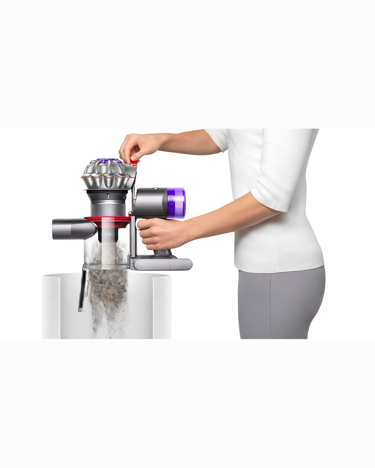 The Dyson V8 vacuum having the bin being emptied.