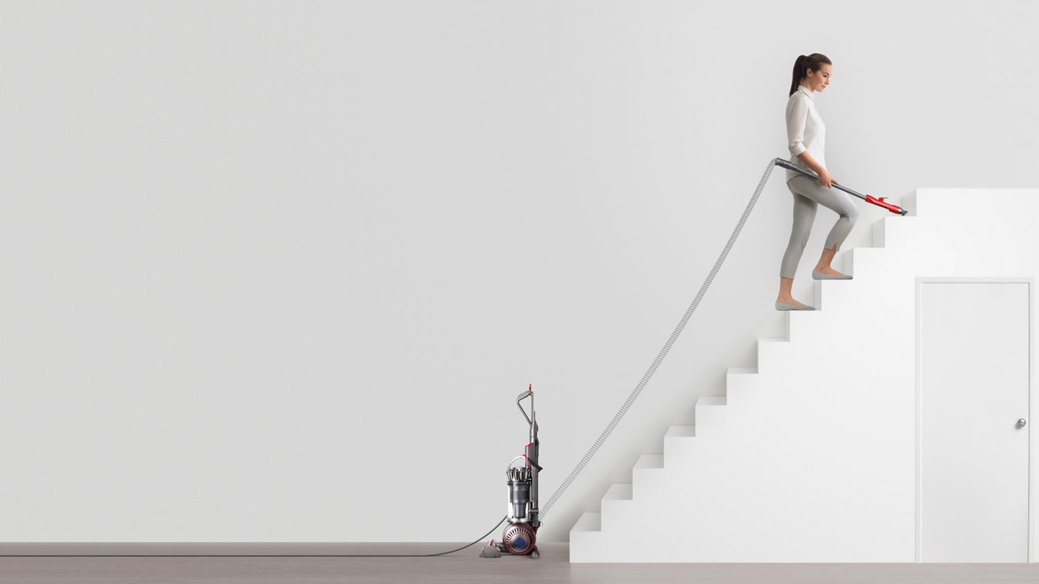Dyson Ball Animal 3 Extra vacuum cleaner used to clean stairs.