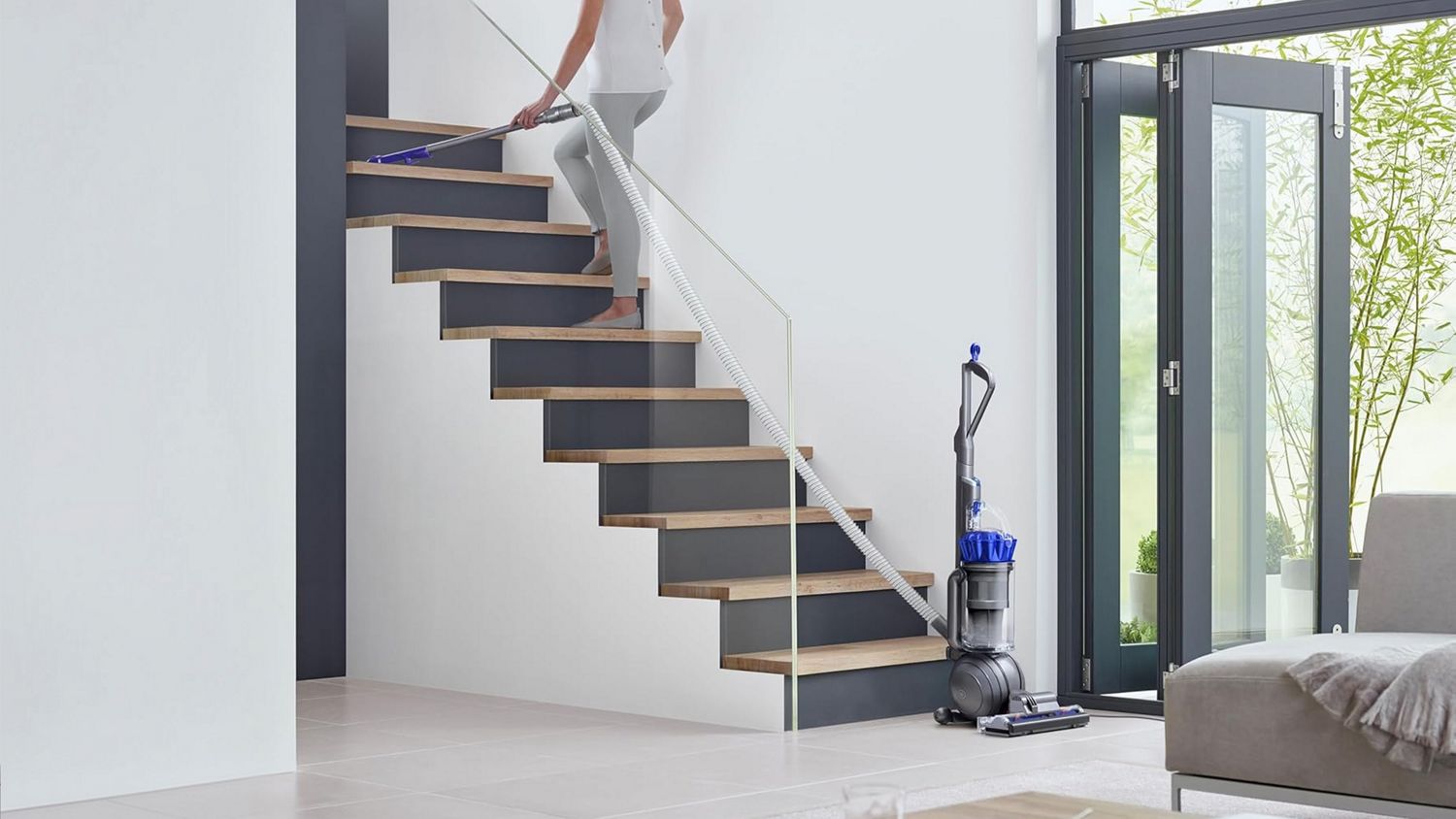 Dyson Ball Animal Origin vacuum cleaner used to clean stairs.
