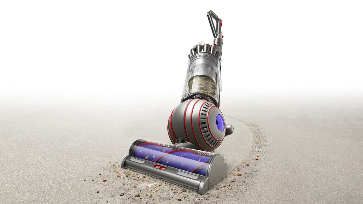 Dyson Ball Animal 3 Extra vacuum cleaner cleans dust and debris from a carpet.
