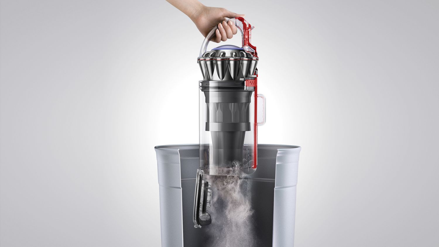 The bin of the Dyson Ball Animal 3 Extra vacuum is emptied.