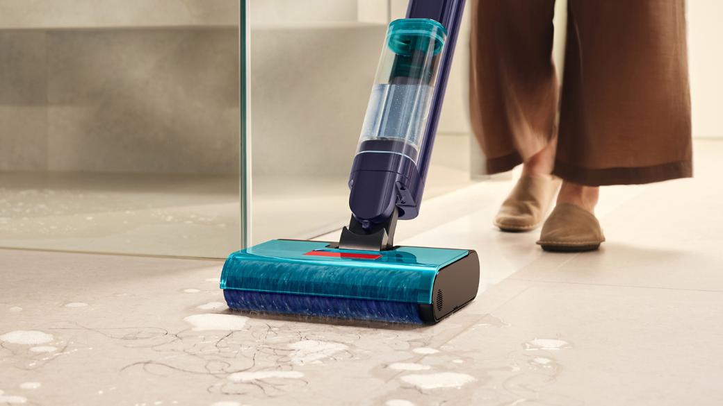 The Dyson Clean+Wash Hygiene hard floor cleaner cleaning wet spills from the floor.